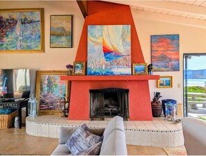Smart TV, fireplace, books