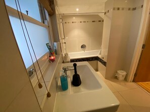 Shower, towels, soap, shampoo