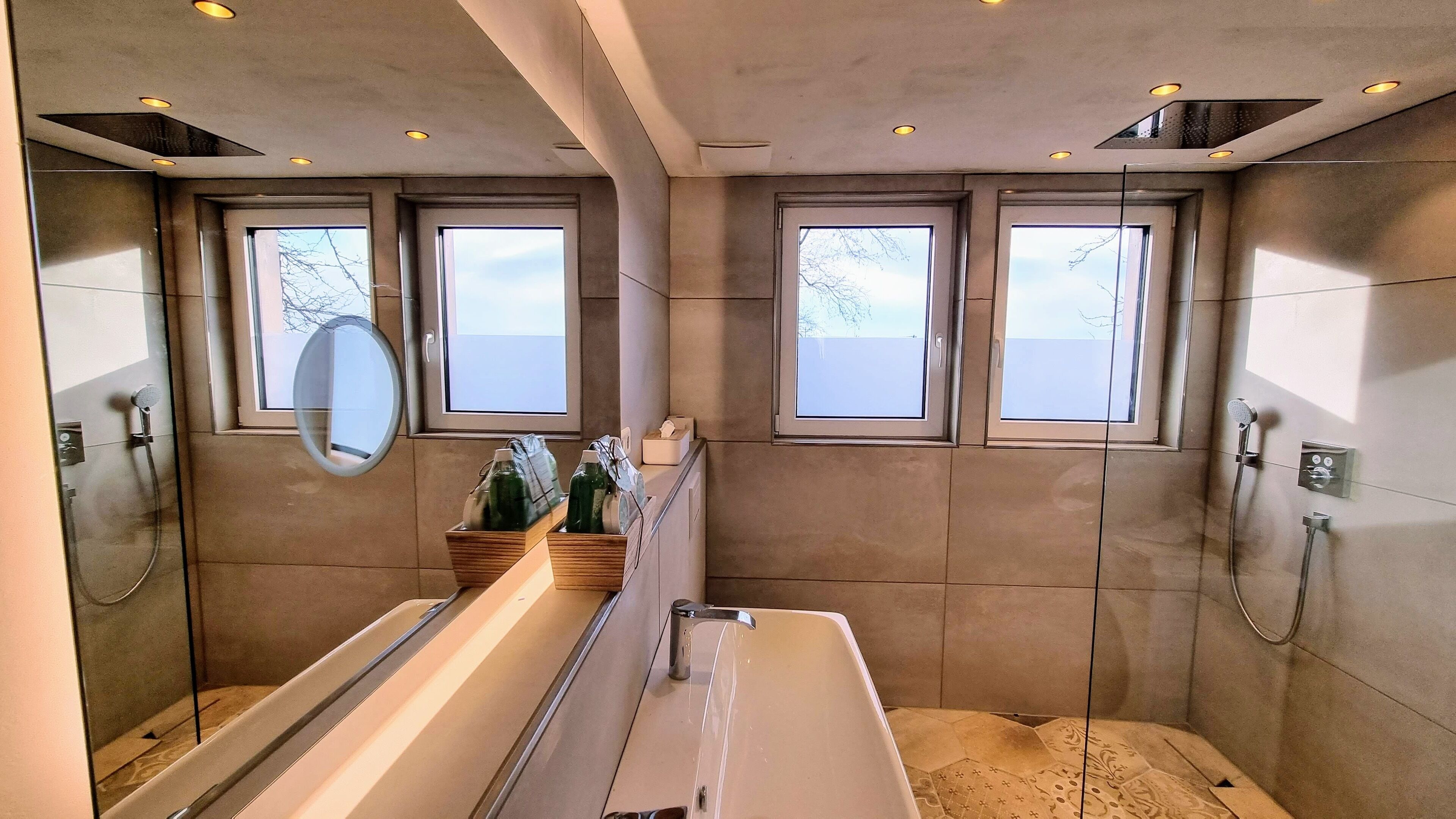 Shower, hair dryer, towels, toilet paper