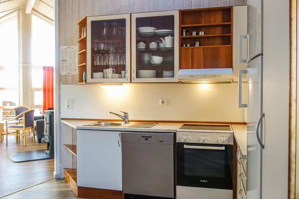 Fridge, stovetop, dishwasher, coffee/tea maker