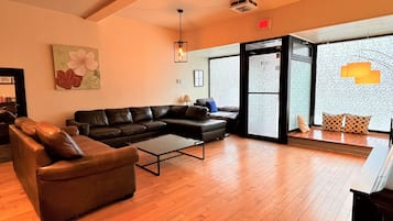 Smart TV, fireplace, foosball, books