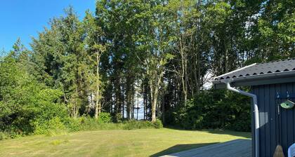 Idyllic summer house at the water's edge
