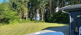 Idyllic summer house at the water's edge