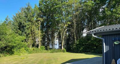 Idyllic summer house at the water's edge