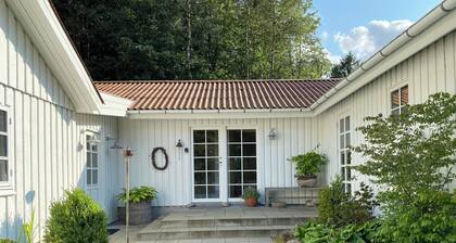 Idyllically situated wooden house by the forest