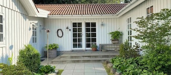 Idyllically situated wooden house by the forest