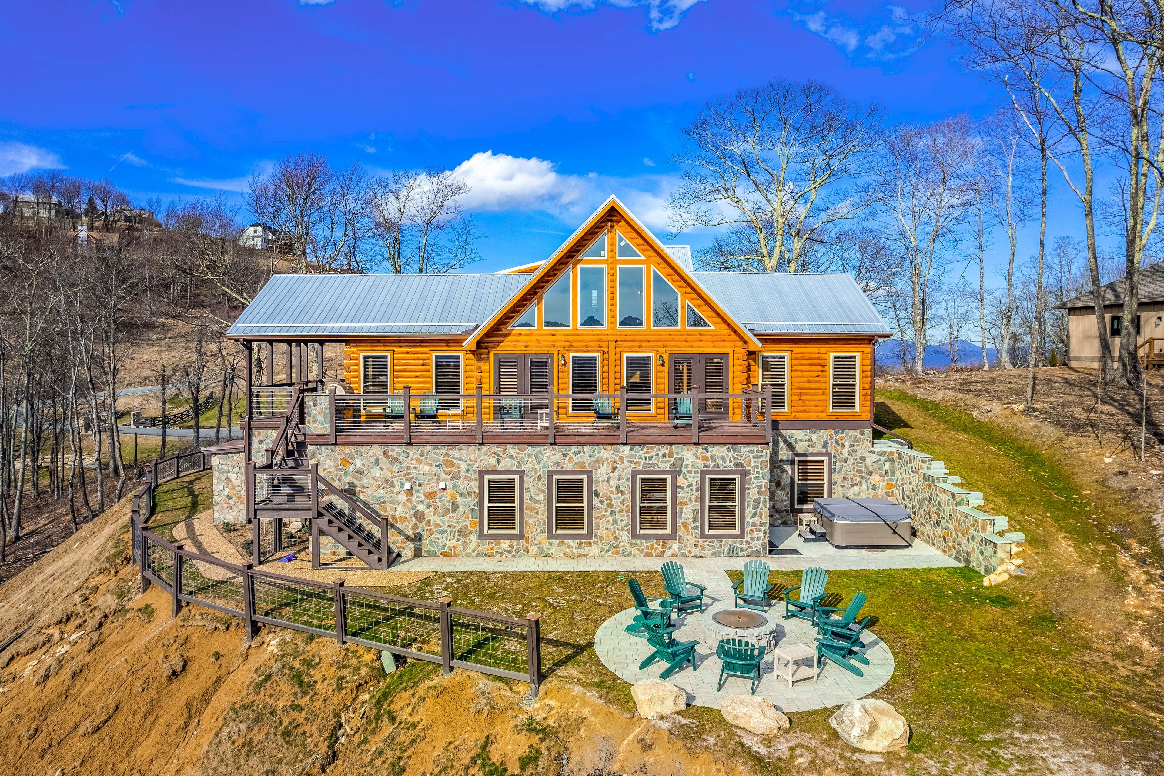 Sprawling mountain view home with hot tub, firepit, grill, game room, & deck