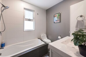 Shower, hair dryer, towels, soap