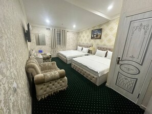 Habitación cuádruple familiar | Wifi gratis y ropa de cama