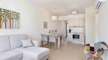 Appartamento Junior | Area soggiorno | TV a schermo piatto