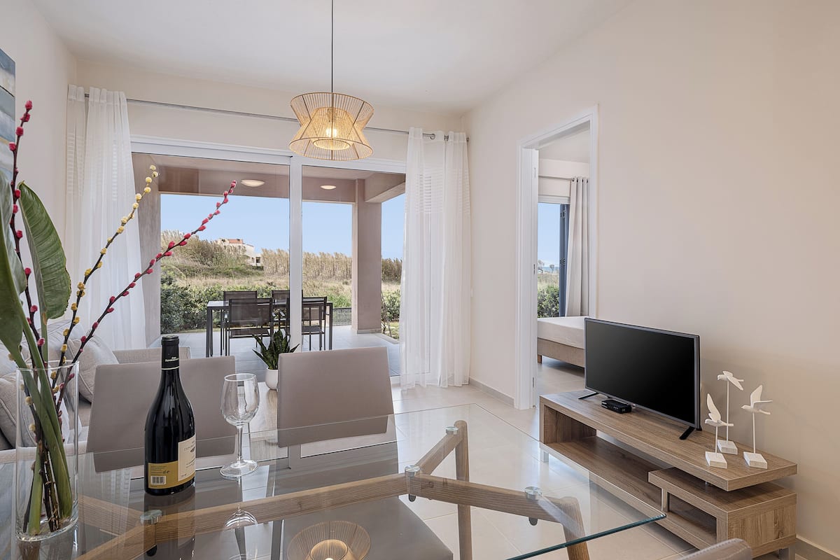Superior Apartment | Living area | Flat-screen TV