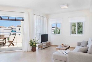 Departamento superior | Área de sala de estar | Televisión de pantalla plana 