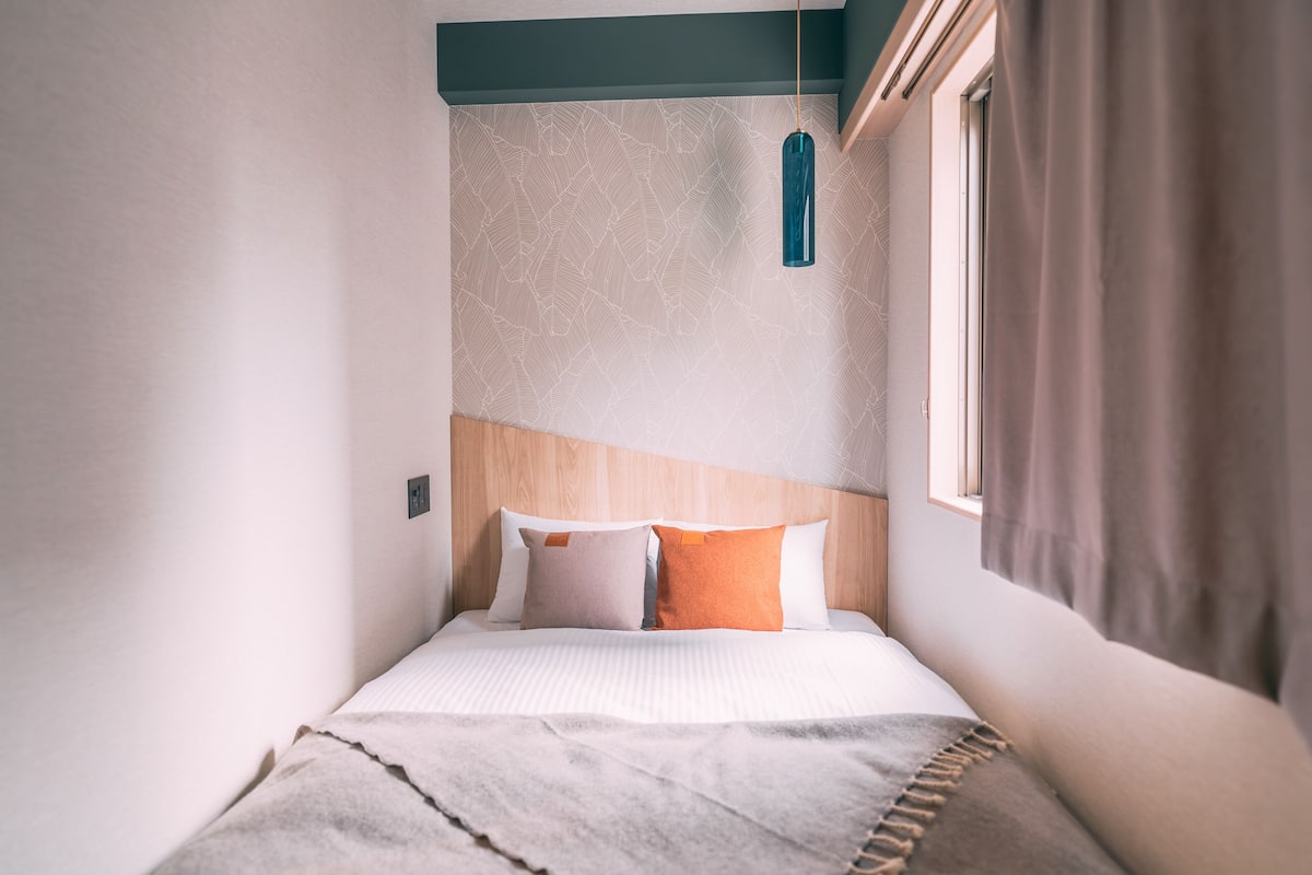 Kamar Double Standar | Seprai premium, selimut bulu angsa, dan tempat tidur Select Comfort
