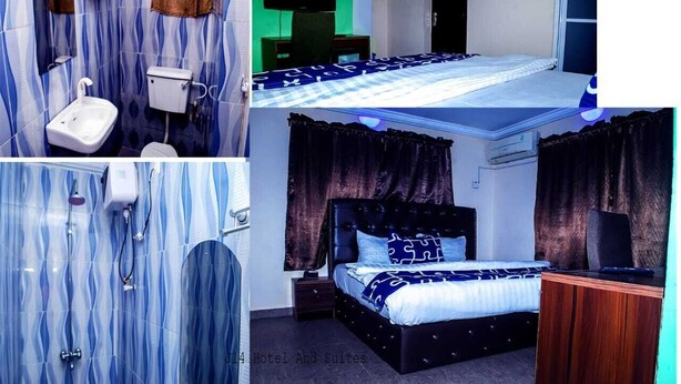 A hotel room with a bathroom, a bed, and a desk. - j14 hotel and suites (Lagos)