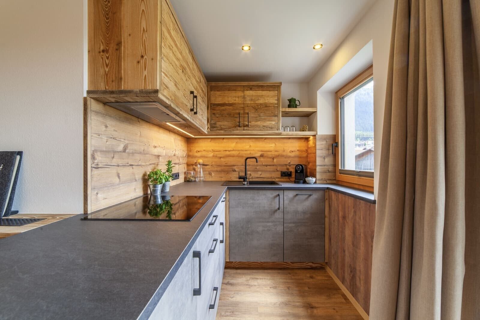 Fridge, stovetop, dishwasher, coffee/tea maker