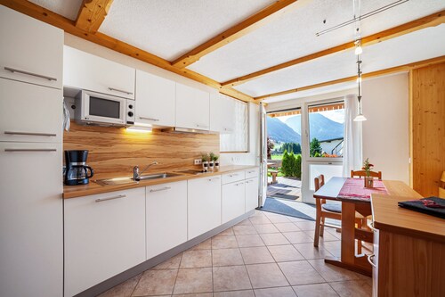 Ferienwohnung 'Mühlanderhof Apt Klopairspitze' mit  Gemeinschaftsterrasse und WLAN