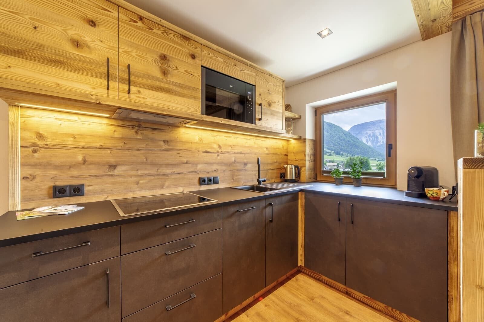 Fridge, stovetop, dishwasher, coffee/tea maker