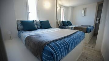 1 habitación, tabla de planchar con plancha, wifi gratis y ropa de cama