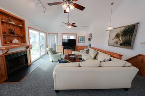 Smart TV, chimenea, reproductor de DVD y tenis de mesa