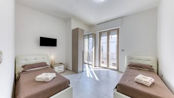 2 dormitorios, tabla de planchar con plancha, wifi gratis y ropa de cama