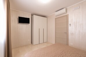 1 slaapkamer, een strijkplank/strijkijzer, gratis wifi, beddengoed