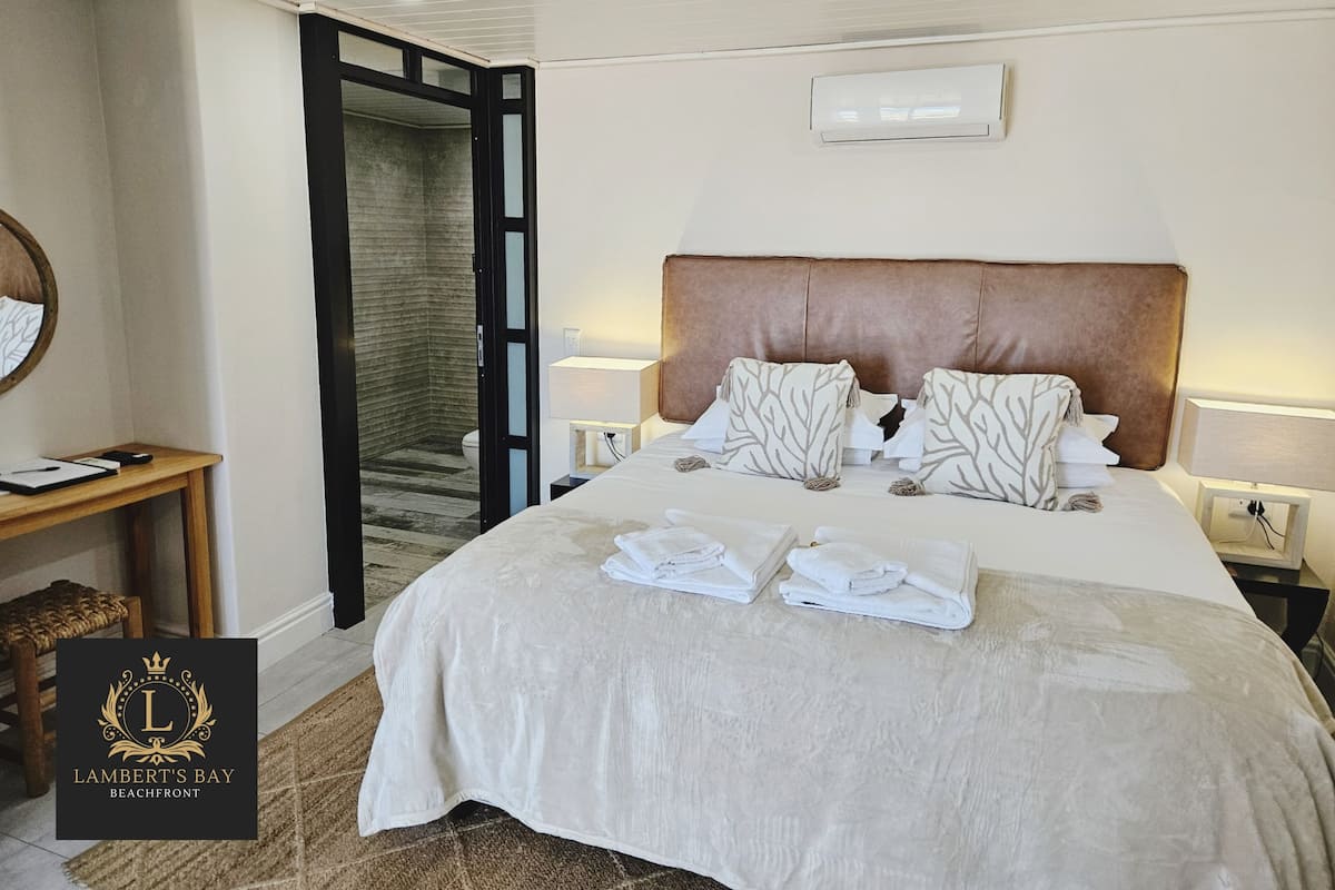 Deluxe kamer | Een kluis op de kamer, individueel gedecoreerd, individueel gemeubileerd