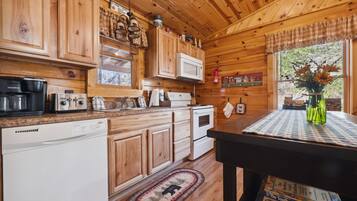 Cabin, 1 Bedroom | Private kitchen | Fridge, oven, coffee/tea maker, toaster