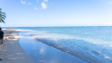 On the beach, sun loungers, beach towels