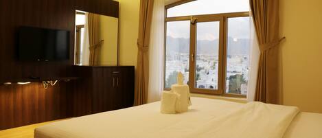 Laptop workspace, free WiFi, bed sheets