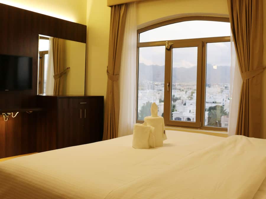 Laptop workspace, free WiFi, bed sheets
