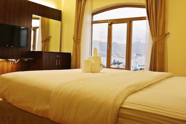 Laptop workspace, free WiFi, bed sheets