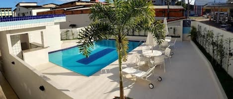 Outdoor pool, pool umbrellas, pool loungers