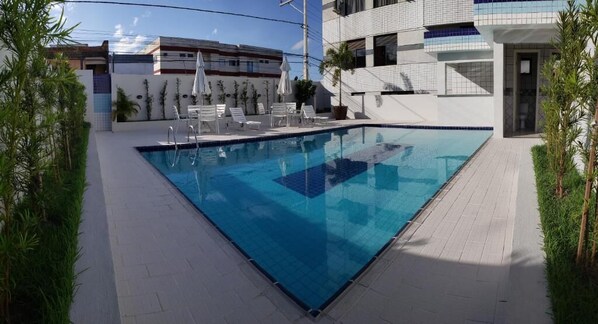 Outdoor pool, pool umbrellas, pool loungers