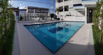 Outdoor pool, pool umbrellas, sun loungers