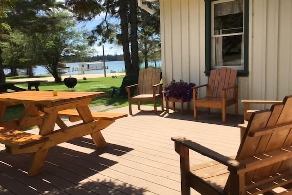 Porch view at Cedar Cottage! Perfect place for coffee and dining outdoors!
