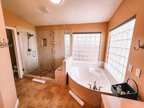 Shower, hair dryer, towels, toilet paper