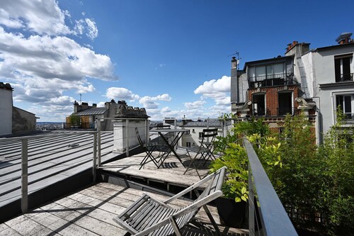 Terrace and view of Paris