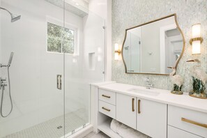 Shower, hair dryer, towels