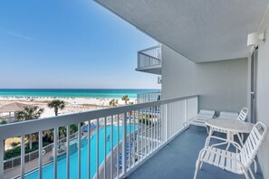 Outdoor dining - Pelican Beach 0413 (2-Bedroom Condo) with Pool by Pelican Beach Management (Destin)