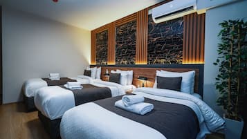 Chambre Triple Standard | Draps italiens Frette, literie de qualité supérieure