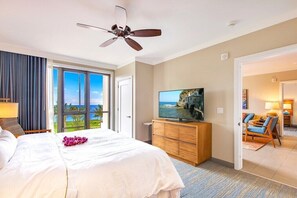 2 dormitorios, caja fuerte, escritorio y tabla de planchar con plancha