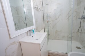 Shower, hair dryer, soap, shampoo