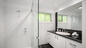 Shower, hair dryer, towels