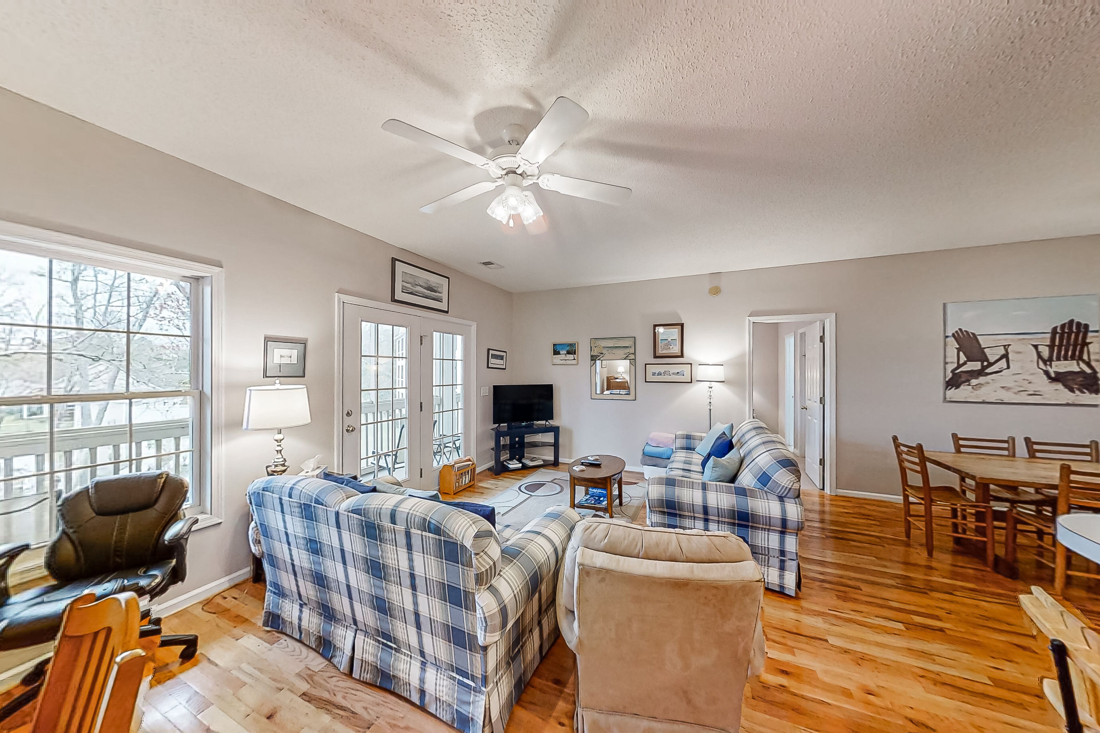 Sunny condo with pond views, board games, washer/dryer, & AC - pool access