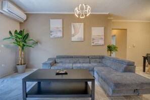 Serenity Apartment (3 Bedrooms) | Living area | 27-inch flat-screen TV with satellite channels, TV -  Rhodes Island Elli Beach Apartments (Rhodes)