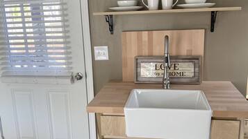 Shower, hair dryer, towels, toilet paper