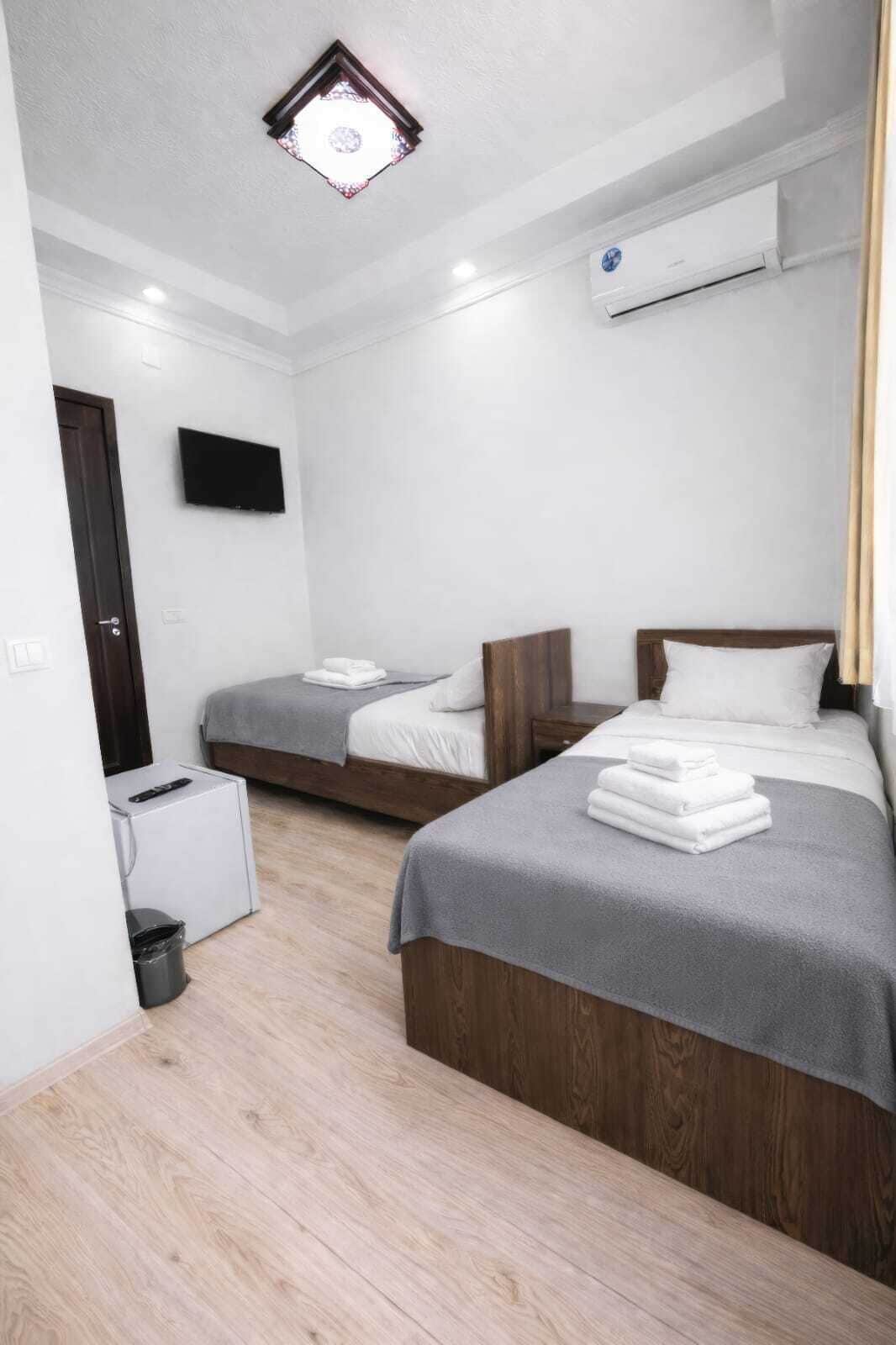 Premium bedding, blackout drapes, iron/ironing board, free WiFi