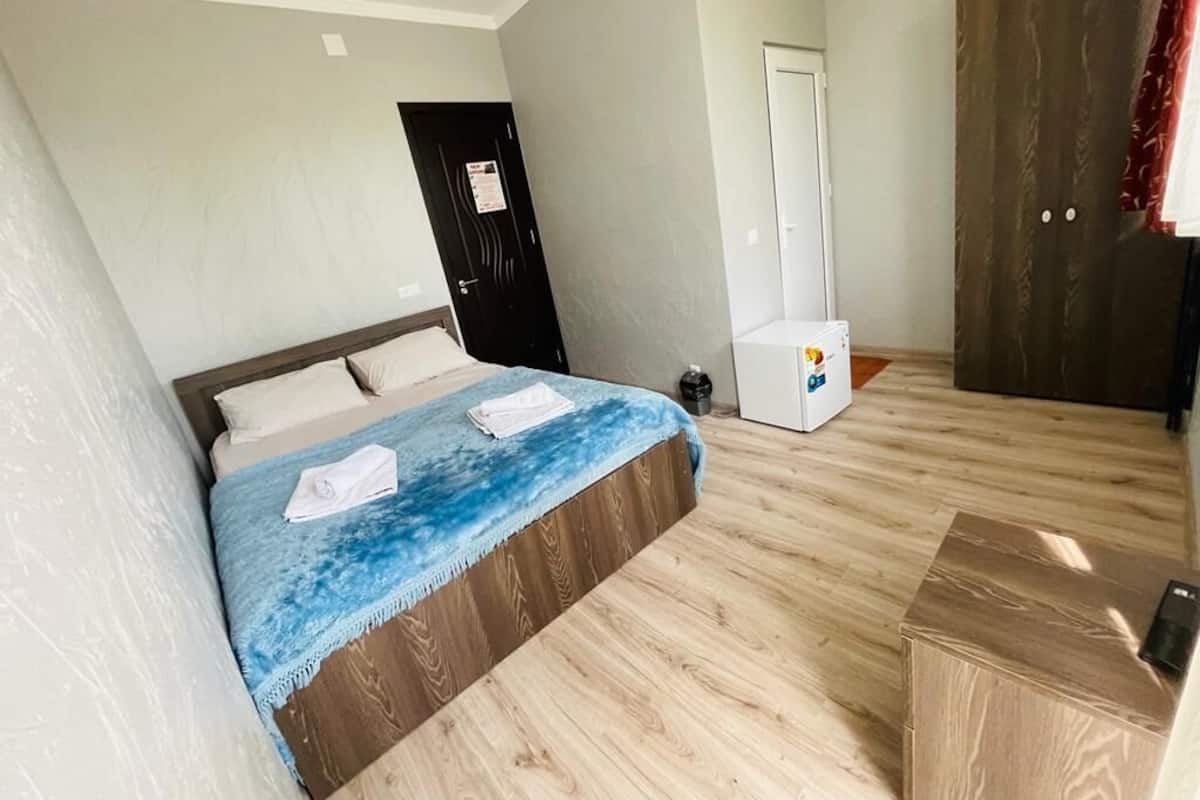 1 bedroom, premium bedding, blackout drapes, iron/ironing board