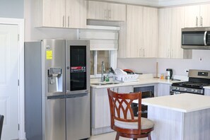 Deluxe Villa | Private kitchen | Full-sized fridge, microwave, oven, stovetop - Beach Holidays at Marina Villa (St. Ann's Bay)