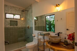 Eco-friendly toiletries, hair dryer, towels, soap